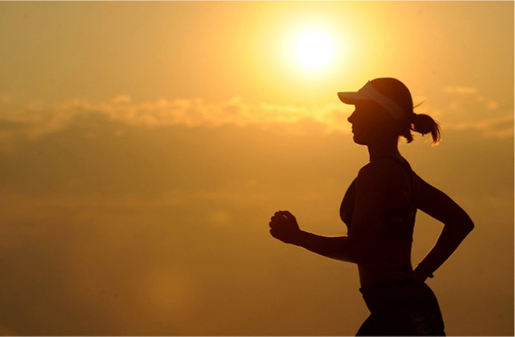 photo - closeup of a woman going for a run